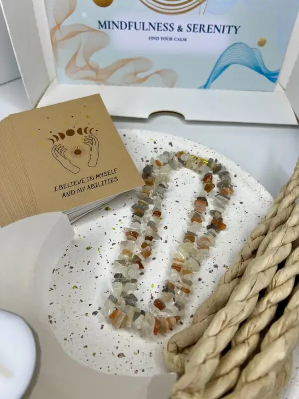 Mindfulness & Serenity Box featuring Moonstone Necklace, Selenite Tea Light Holder, Tibetan Rope Incense, and Affirmation Cards for calm and balance.