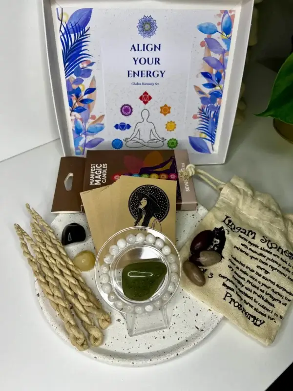 Chakra Harmony Deluxe Gift Box with seven chakra candles, moonstone bracelet, incense, affirmation cards, agate tumblestones, and lingam stones.