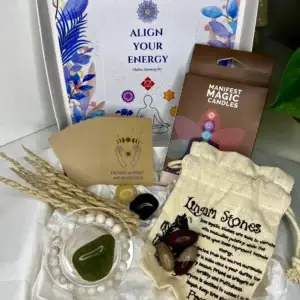 Chakra Harmony Deluxe Gift Box with seven chakra candles, moonstone bracelet, incense, affirmation cards, agate tumblestones, and lingam stones.