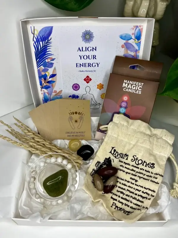 Chakra Harmony Deluxe Gift Box with seven chakra candles, moonstone bracelet, incense, affirmation cards, agate tumblestones, and lingam stones.